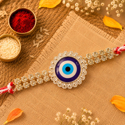 Premium Rakhi showcasing Evil Eye Charm, leaf touch and thread look for Gift Use