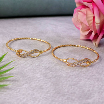 Gold plated infinity design stone bracelet pair front view