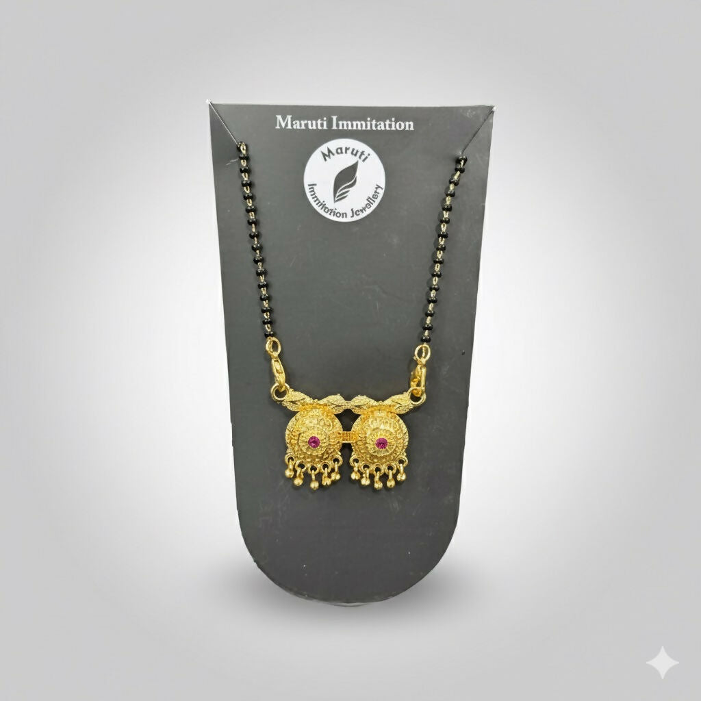 The The Eternal Embrace mangalsutra. The elegant pendant is made of high-quality gold-plated brass.