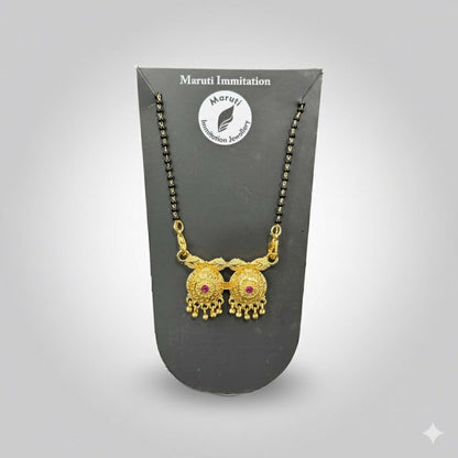 The The Eternal Embrace mangalsutra. The elegant pendant is made of high-quality gold-plated brass.