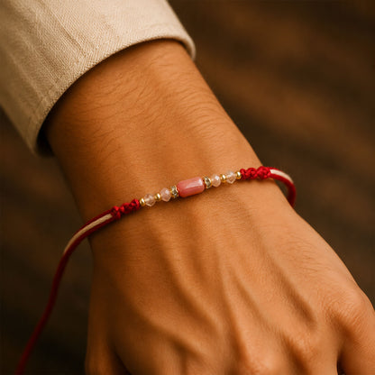 Sparkling Pearl Stone Rakhi with Colorful Thread and Premium Festive Beauty