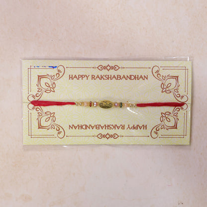 Red Thread Rakhi with Multicolour Beads and Gold Oval Floral Charm