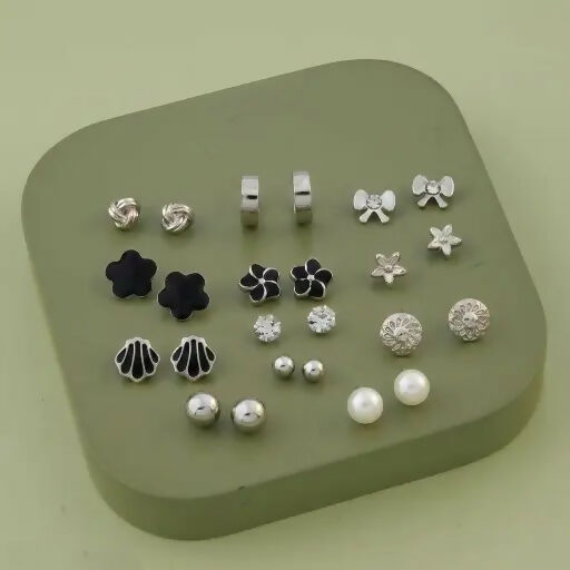Floral and geometric design silver and black stud earrings from the set