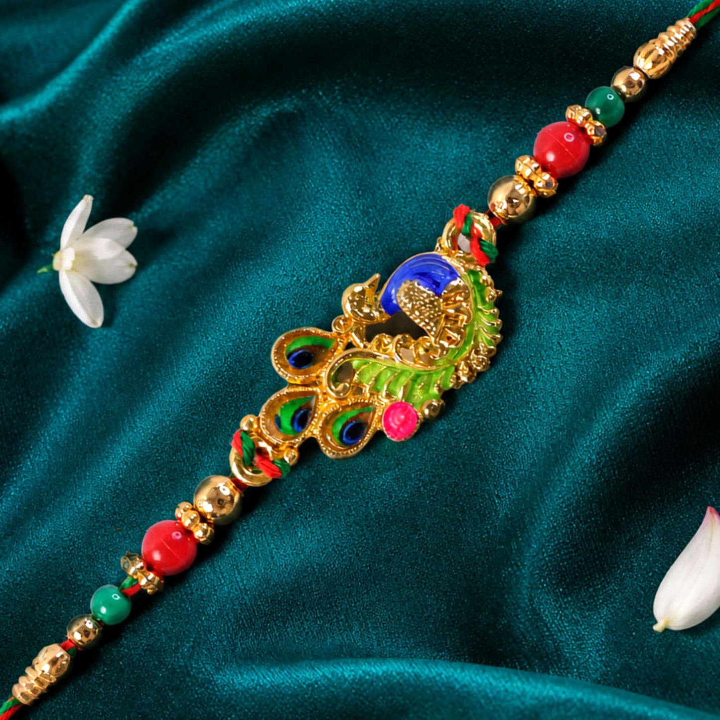 Green and Blue Peacock Enamel Pendant Rakhi with Red and Green Beads