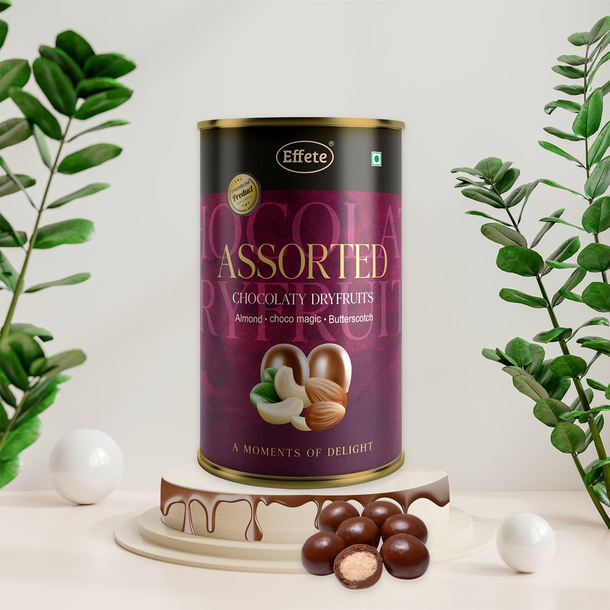 Effete assorted chocolaty dryfruits can on a white tiered stand with chocolate balls and green foliage.