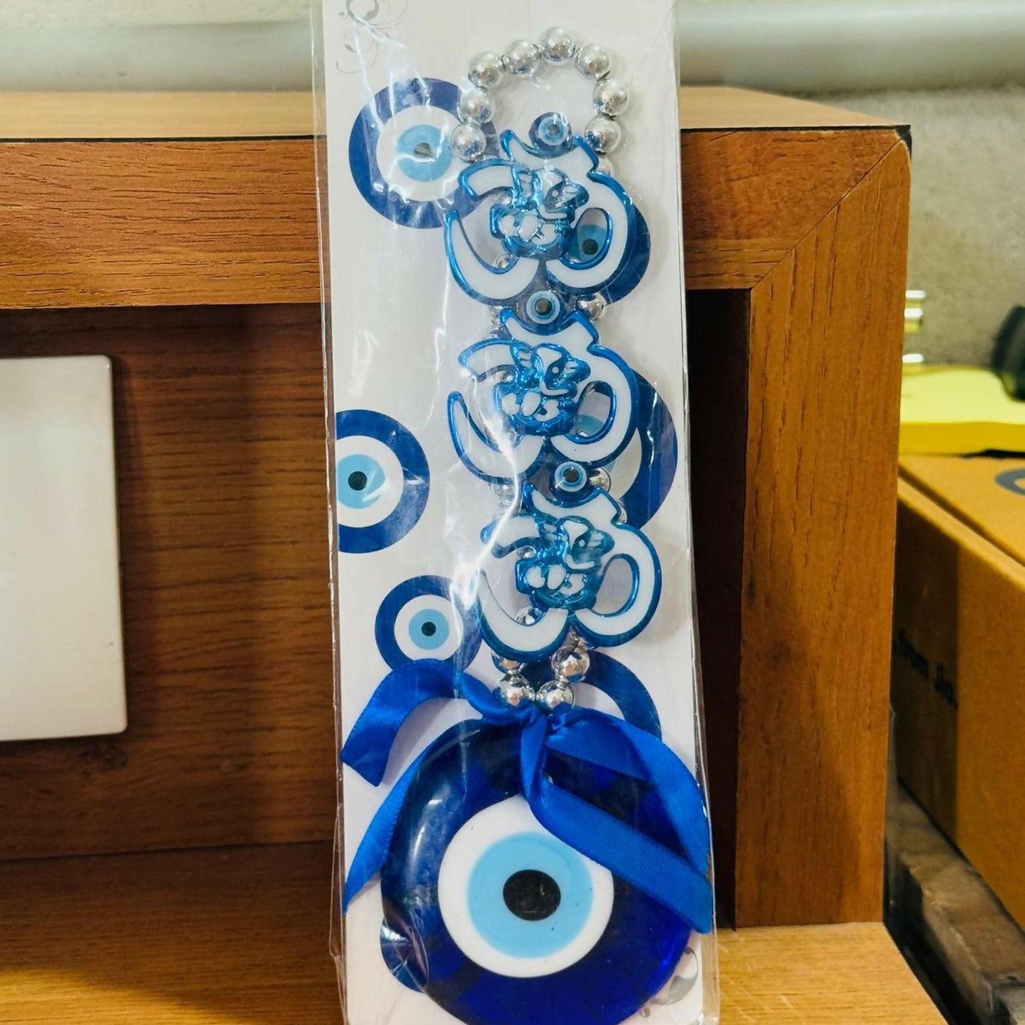 Spiritual Evil Eye Wall Hanging with Om Symbol and Blue Nazar Protection Charm | Decorative Home & Office Wall Hanging with Beads & Ribbon Bow | Vastu & Feng Shui Good Luck Gift Item