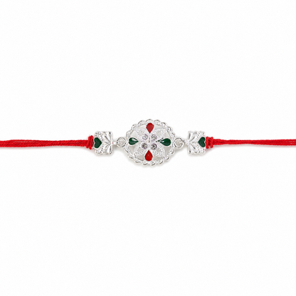 White Silver Floral Rakhi with Red Stone Center and Side Charms