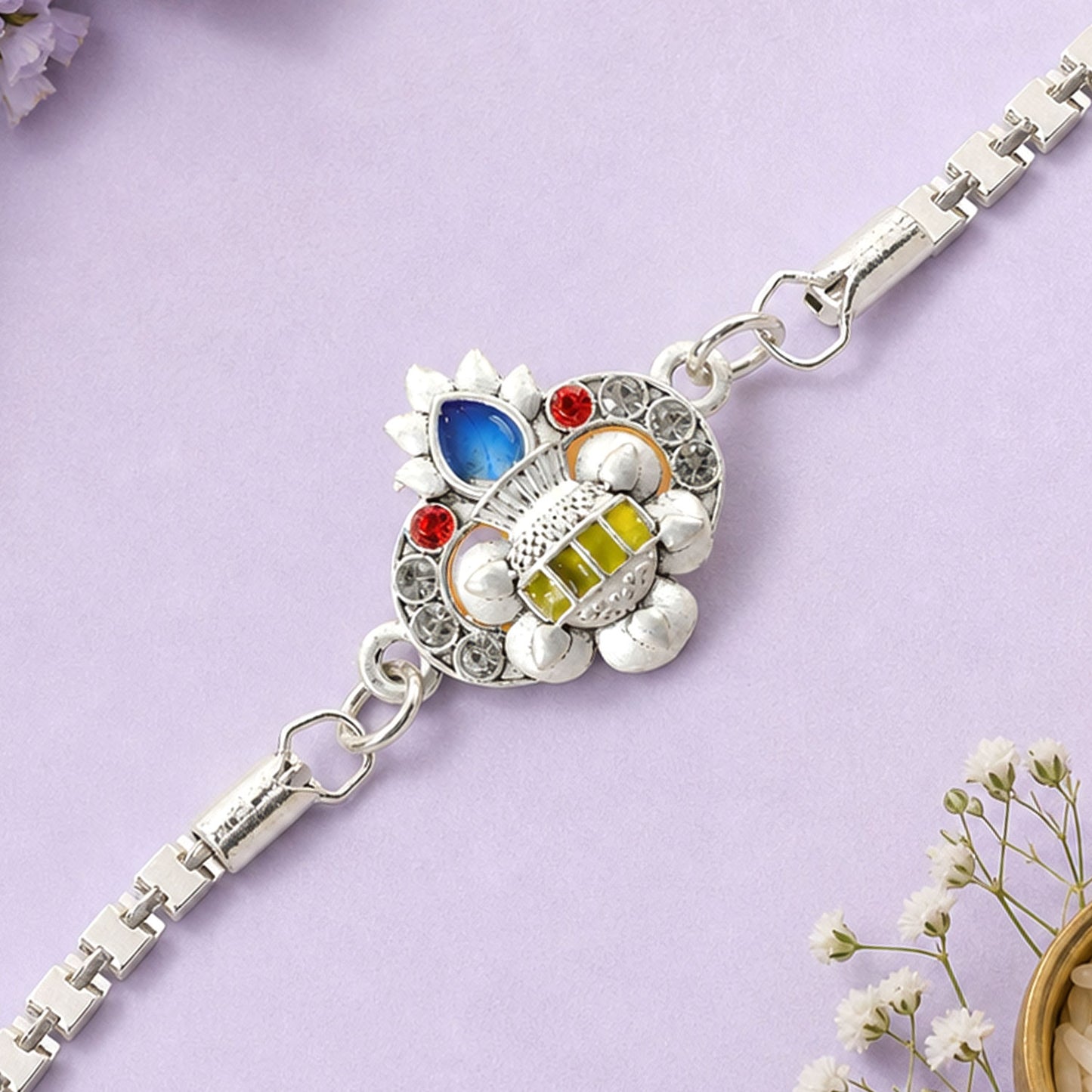 Kalash Lotus Petal Enamel Crystal Studded Silver Chain Designer Rakhi
