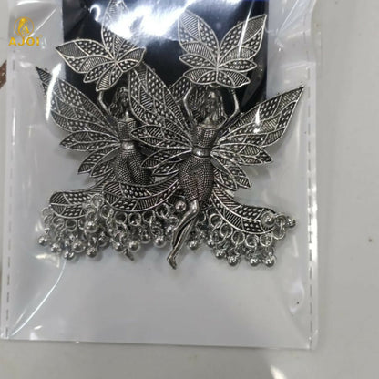 Accessorize with oxidized silver fairy wing statement earrings
