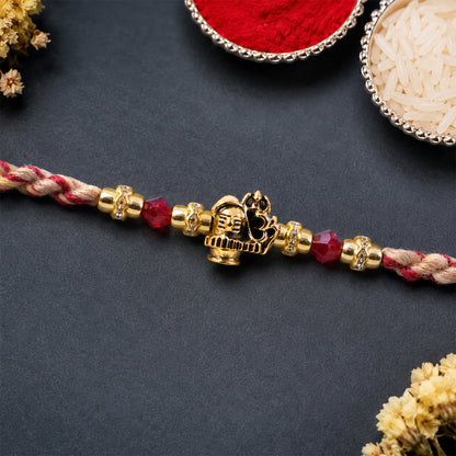 Sacred Deity Rakhi with Red-Beige Thread and Gold Pendant for Raksha Bandhan Gift
