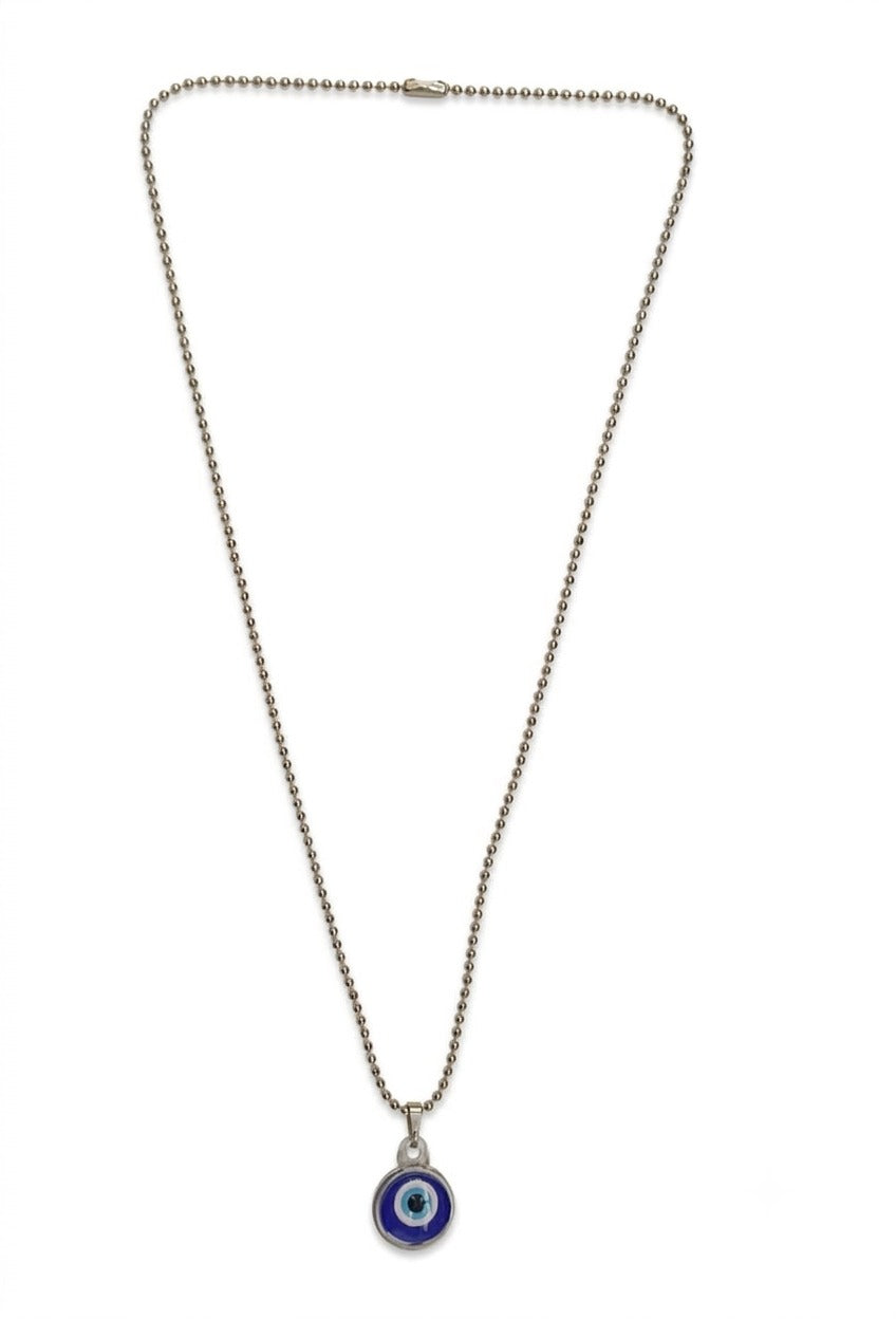 Lifestyle image highlighting versatility of evil eye pendant necklace