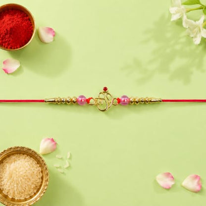 Close up of a festive rakhi from the Om Hari Rakhi Combo pack.