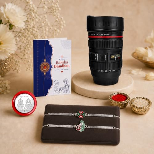 A Rakshabandhan gift set features two silver bracelets, a greeting card, a camera lens-shaped mug, and small bowls of red