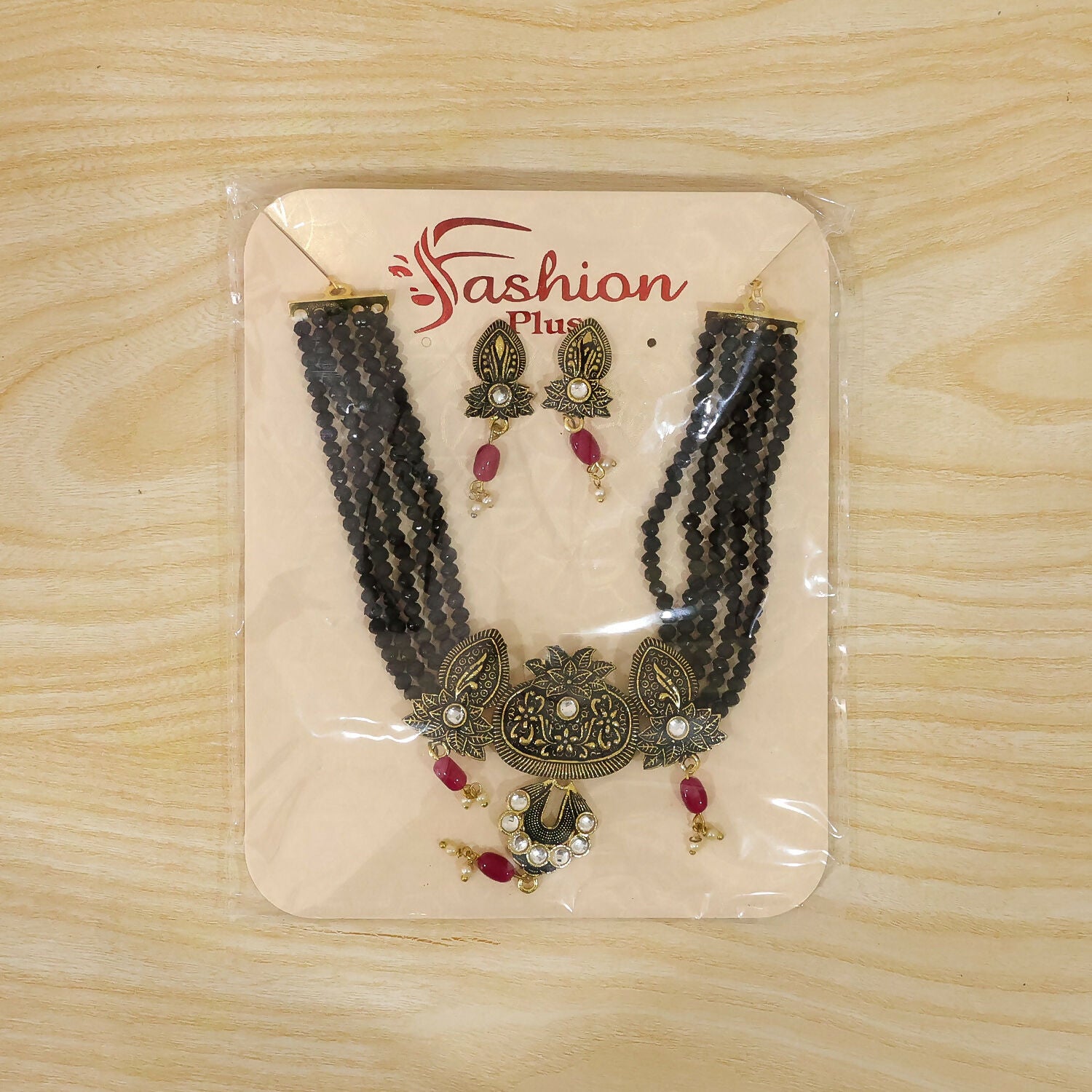 Matching earrings from black beaded necklace set
