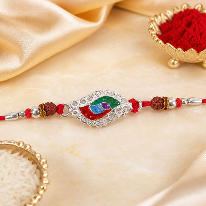 Silver Meenakari Marquise Rakhi with Rudraksha beads, ideal for Raksha Bandhan.