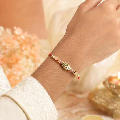 Circular Medallion Bhai Bhabhi Rakhi with Oval Medallion and Floral Tassel for Gift