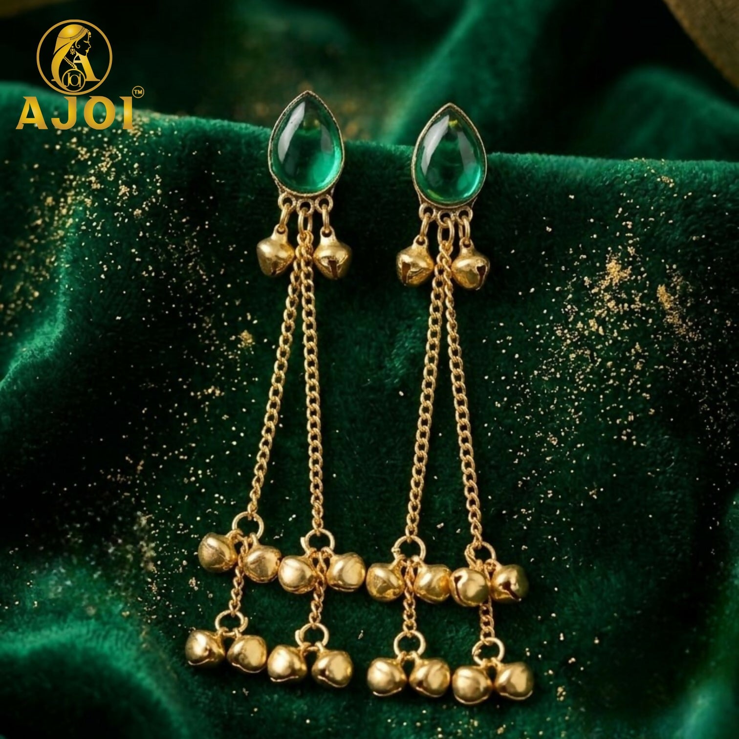 Side view of a green stone gold plated earring with ghungroo bells