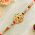 Divine Rakhi with Circular Sacred Medallion and gold trims in chain look for Gift Use