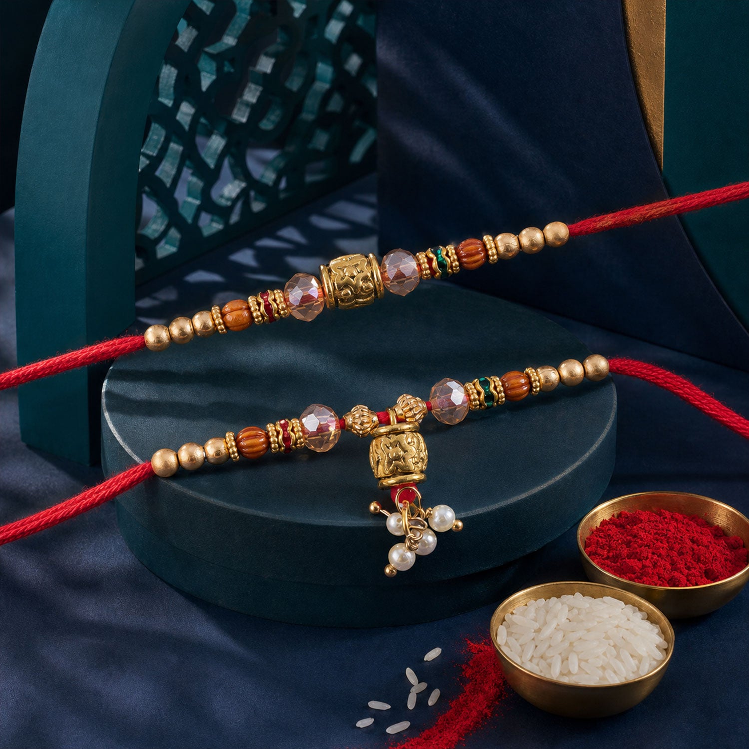 Couple Rakhi with Crystal Beads, Gold Cube Charm and Pearl Drop