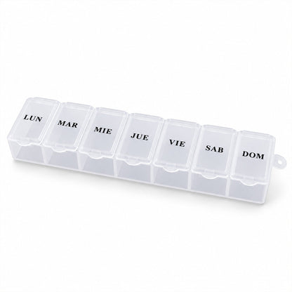 A translucent plastic 7-day pill organizer with Spanish day labels is shown on a plain white background.