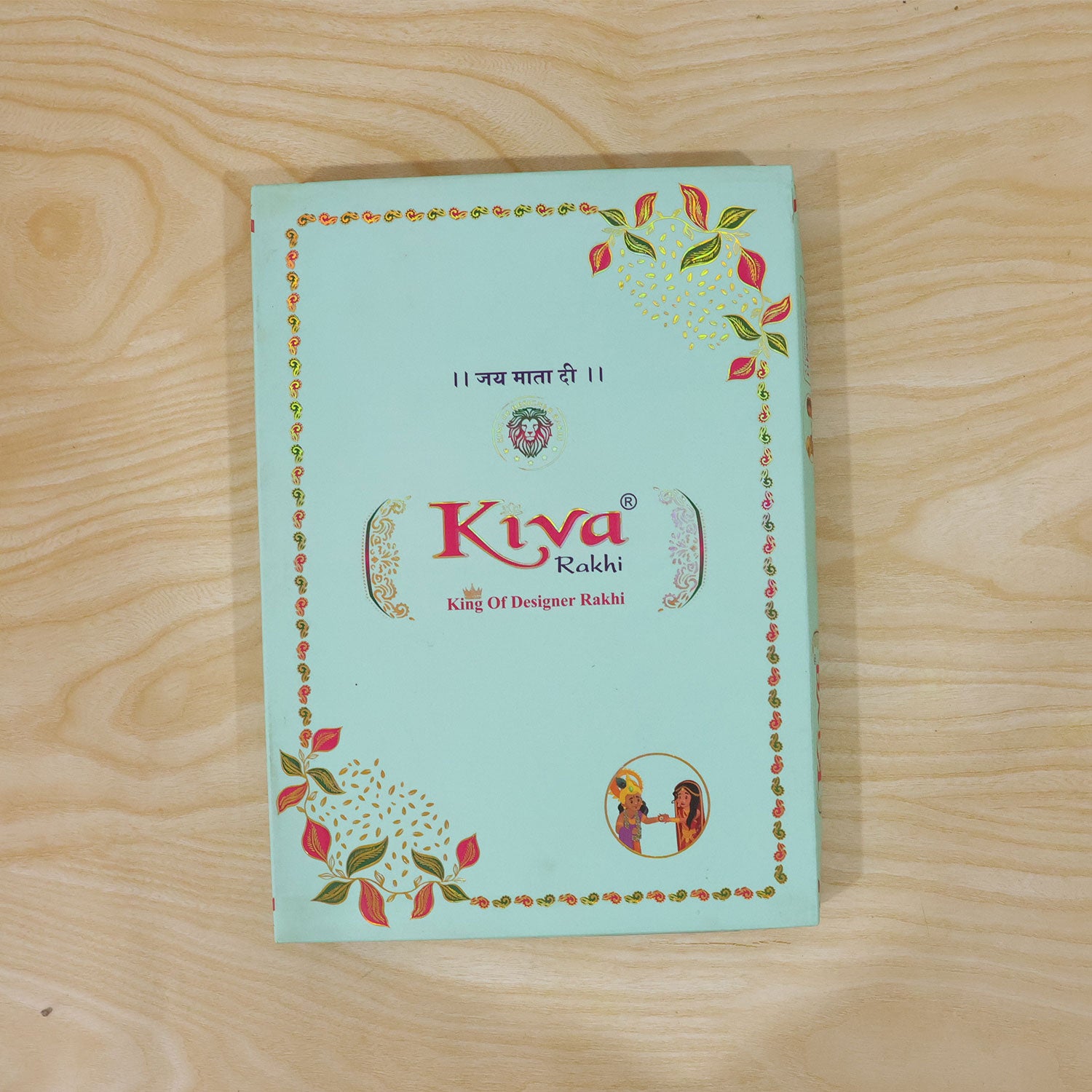 Sunburst Stone Rakhi with Magenta Centre, Pearl Beads, Roli Chawal Coin and Card Packing