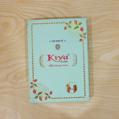 Sunburst Stone Rakhi with Magenta Centre, Pearl Beads, Roli Chawal Coin and Card Packing