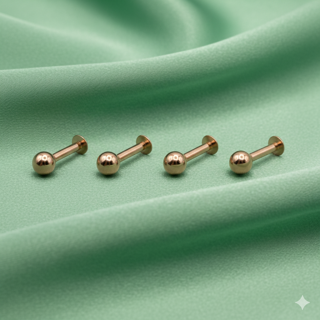 Close-up view of rose gold plated nosepin stud showcasing smooth finish and secure threadless fit