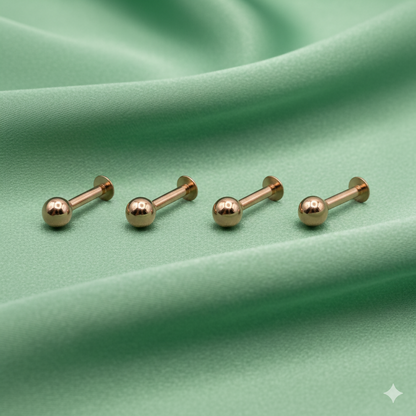 Close-up view of rose gold plated nosepin stud showcasing smooth finish and secure threadless fit