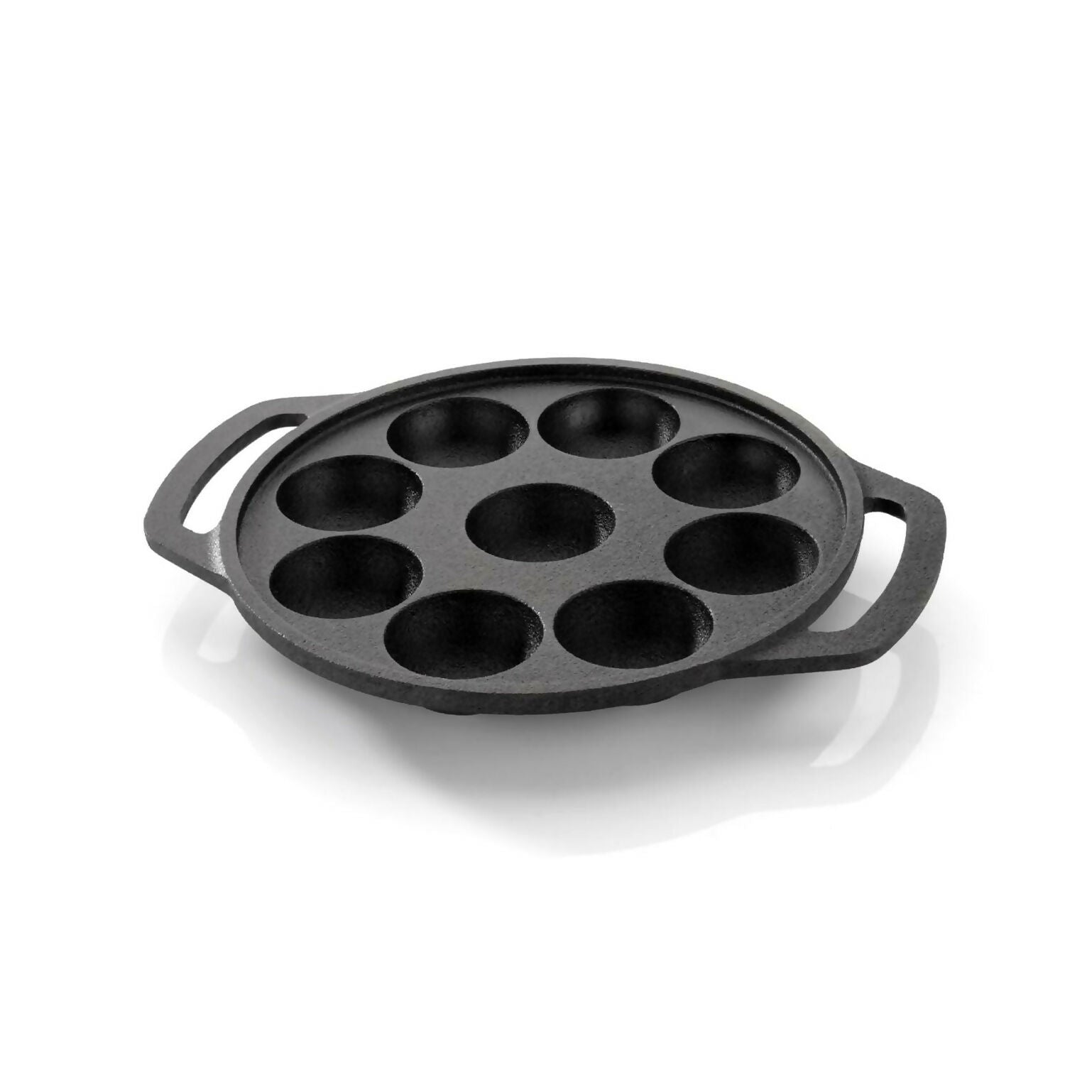 Side angle of cast iron 9 cavity appam patra on stove