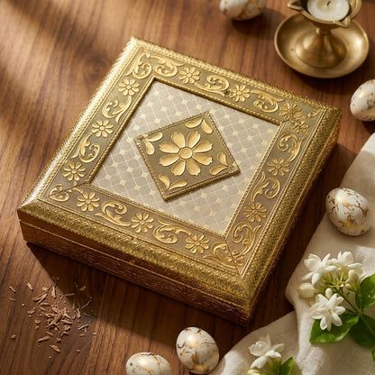 Full view of golden floral embossed metal jewelry box