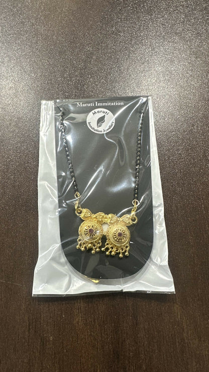 The Couple in Heart Design Magalsutra.