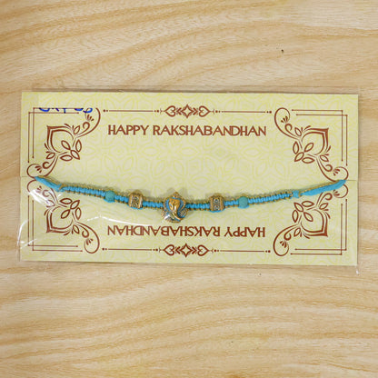 Turquoise Center Designer Rakhi with Gold Tone Detail and Elegant Bracelet Beauty
