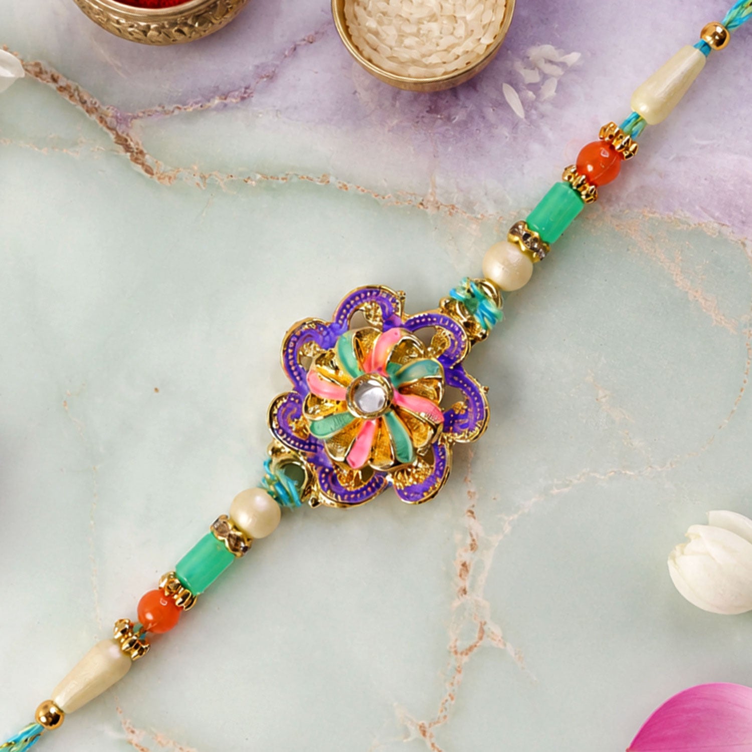 Floral Bloom Rakhi with Cream Thread, Pastel Beads and Soft Enamel Petals for Gifting