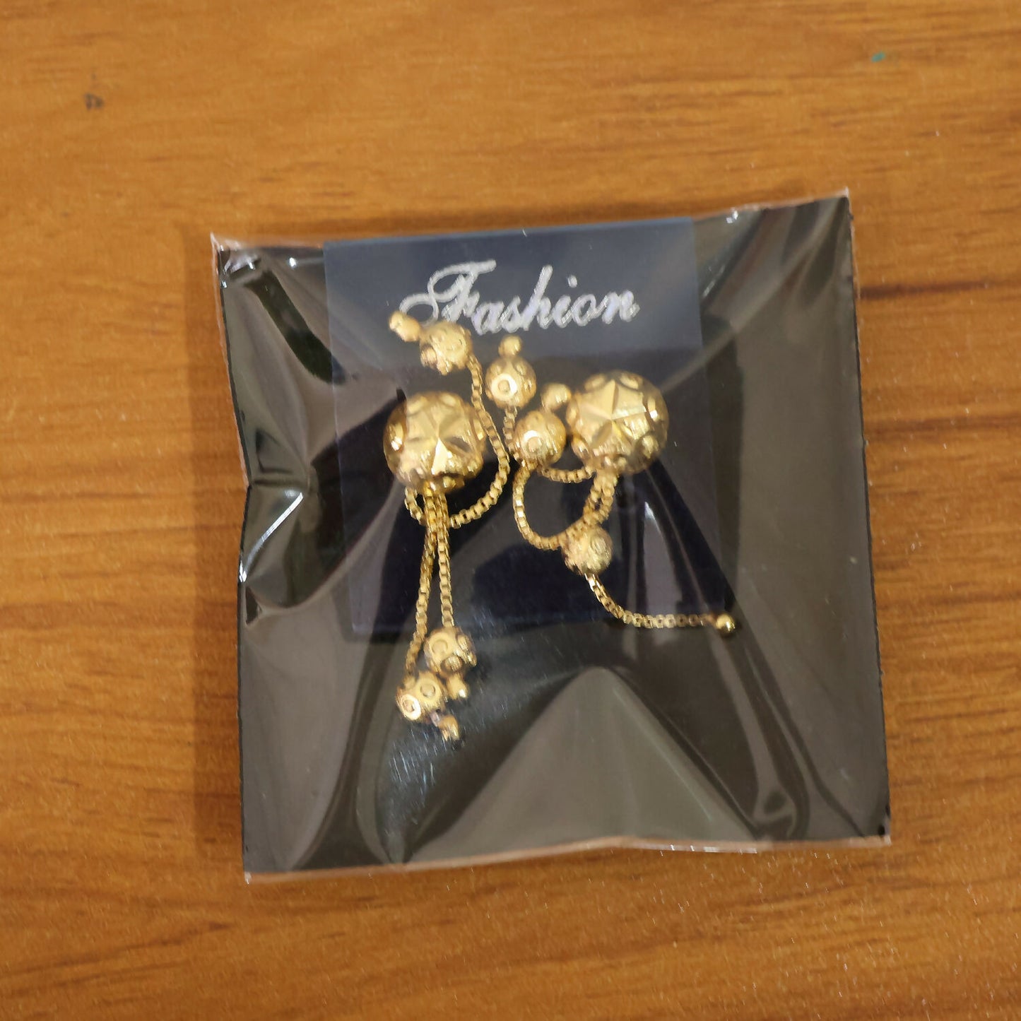 Heart Motif Designer Gold Earrings With Stone Line Work And Elegant Hanging Drop