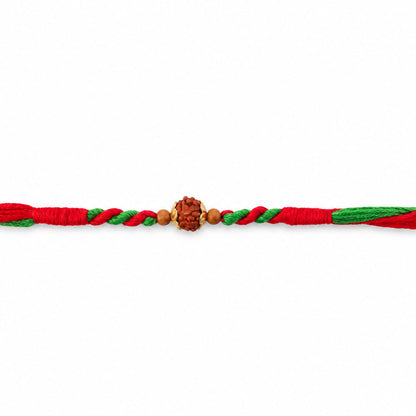 Green Red Designer Rakhi with Golden Bead Accents and Traditional Festive Beauty