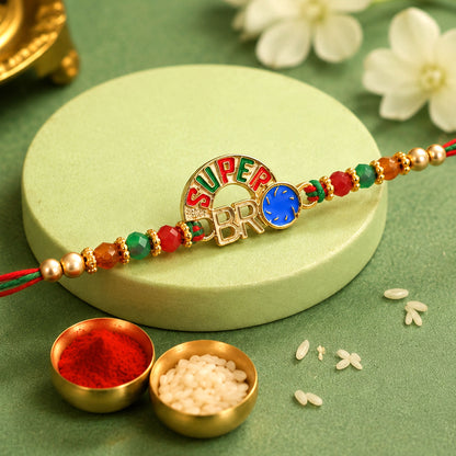 Super Bro Golden Rakhi with Colorful Beads, Blue Charm and Premium Festive Look