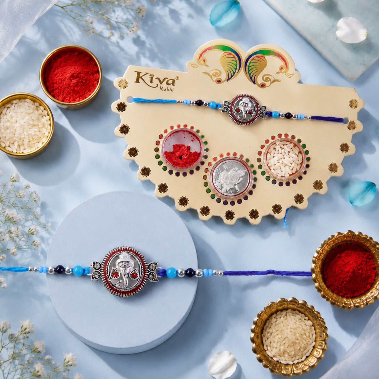 Round Ganesha Medallion Rakhi with Blue Thread, Roli Chawal Coin and Peacock Card Packing