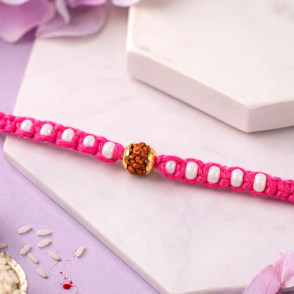 Pink-White Braided Rakhi with Natural Rudraksha Bead Pendant