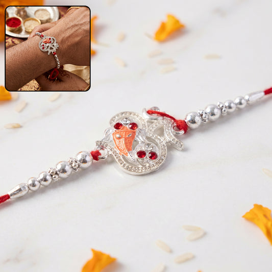 Silver Om Ganesh Rakhi with Red Stones and Metal Bead Chain