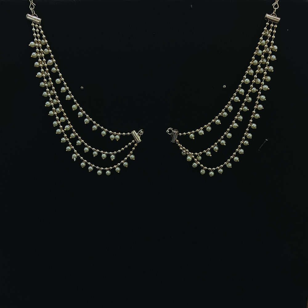 Close-up of white pearls on Kaan Chain