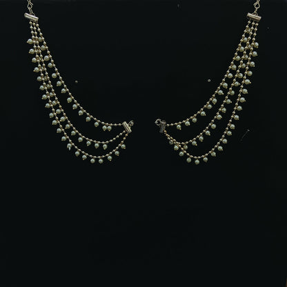 Close-up of white pearls on Kaan Chain
