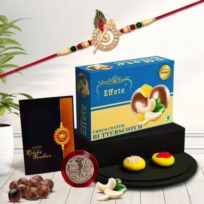 Swastik Rakhi Gift Combo with Choco Coated Butterscotch, Roli-Chawal, Coin & Raksha Bandhan Greeting Card for Brother