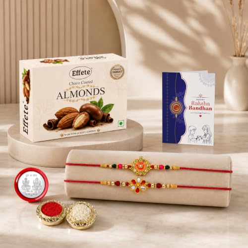 A gift set features a box of chocolate-coated almonds, a greeting card, two floral bracelets, a silver coin, and two small
