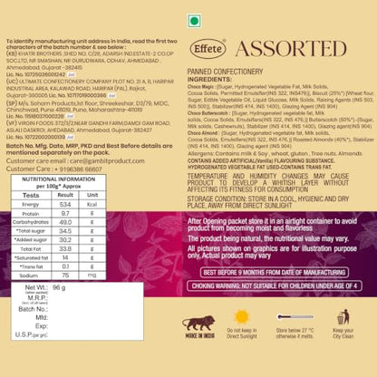 The back of a tall beige tin of assorted chocolaty dry fruits shows detailed nutritional information and ingredients in