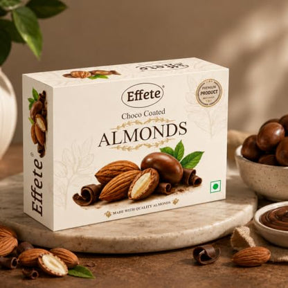 A white box of Effete Choco Coated Almonds with an illustration of almonds and chocolate on the front, surrounded by loose