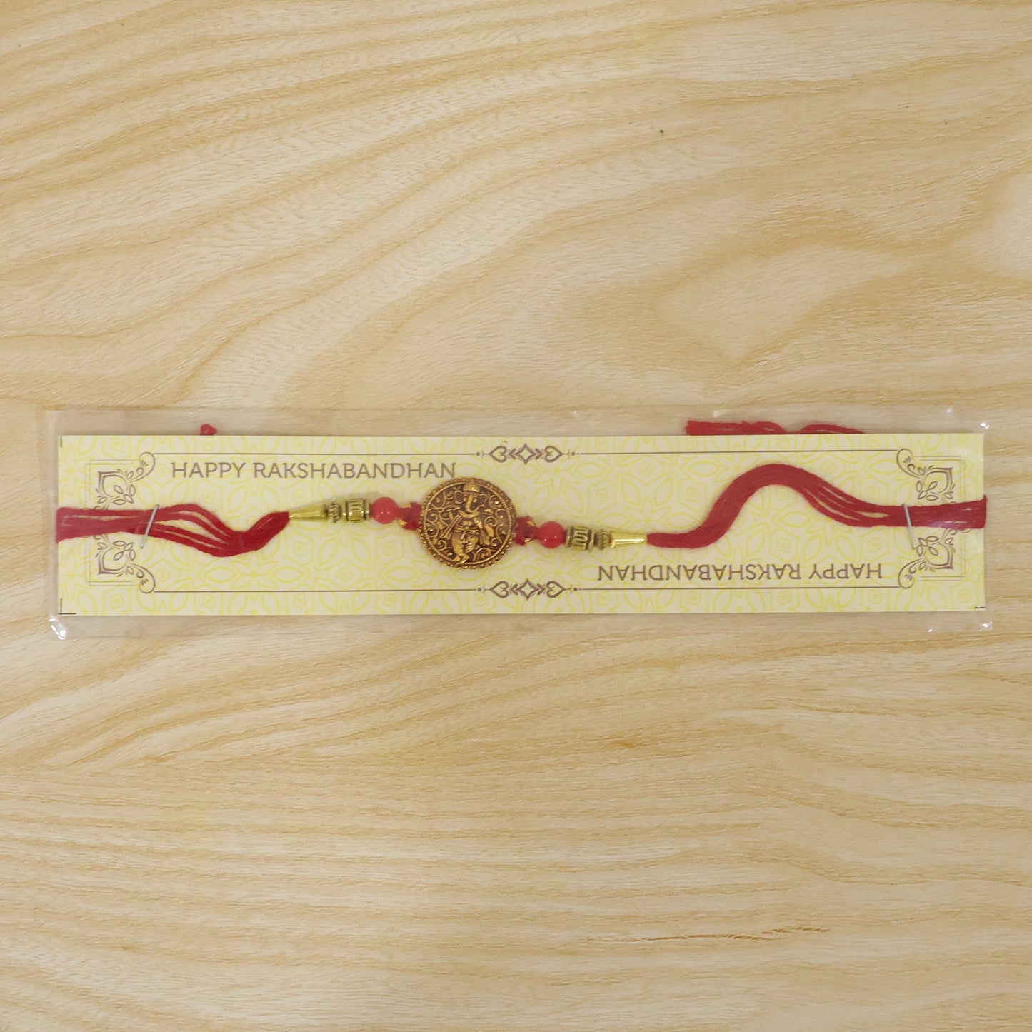 Ganesha Coin Rakhi Antique Design with Vibrant Red Beads (10pcs)