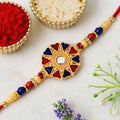 Floral Rakhi with Golden Beads Traditional Design for Brothers