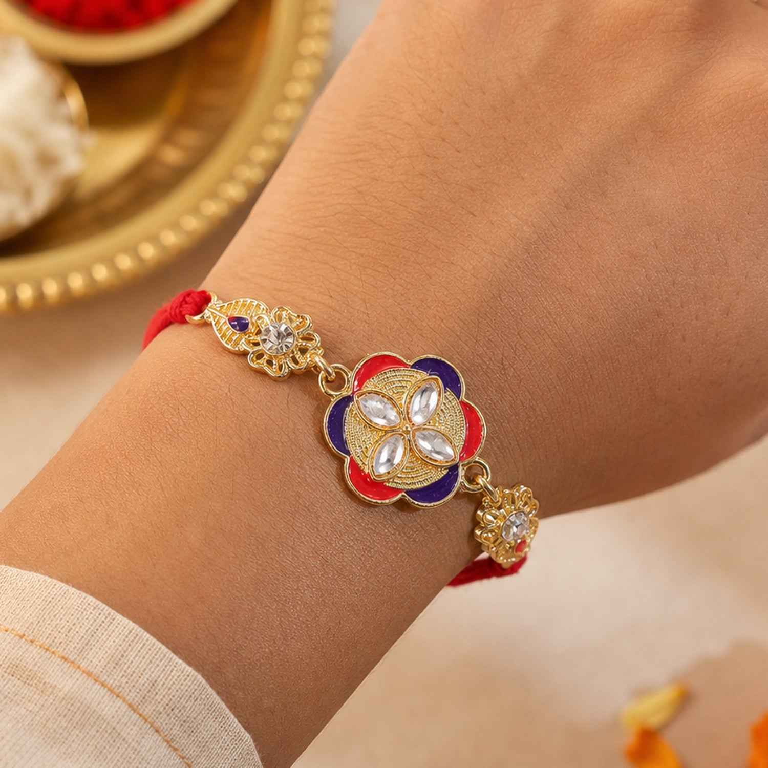 Ornate Rakhi with Floral Medallion, multicolor stones and display look for Gift Use