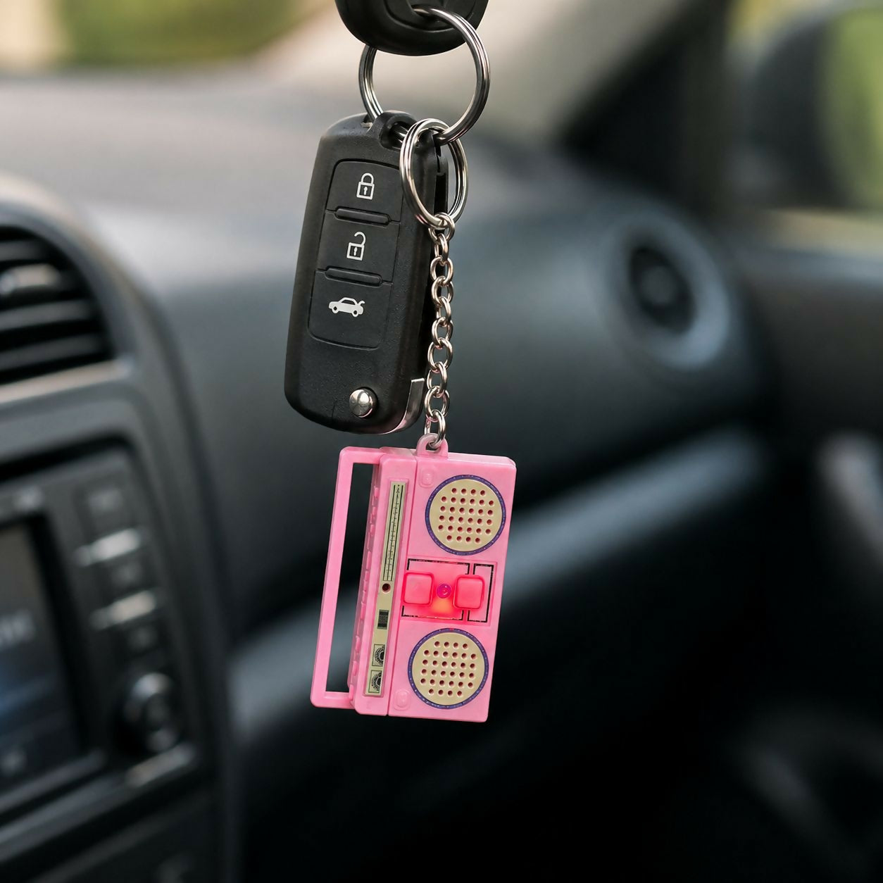 Compact retro radio voice recorder attached to keyring