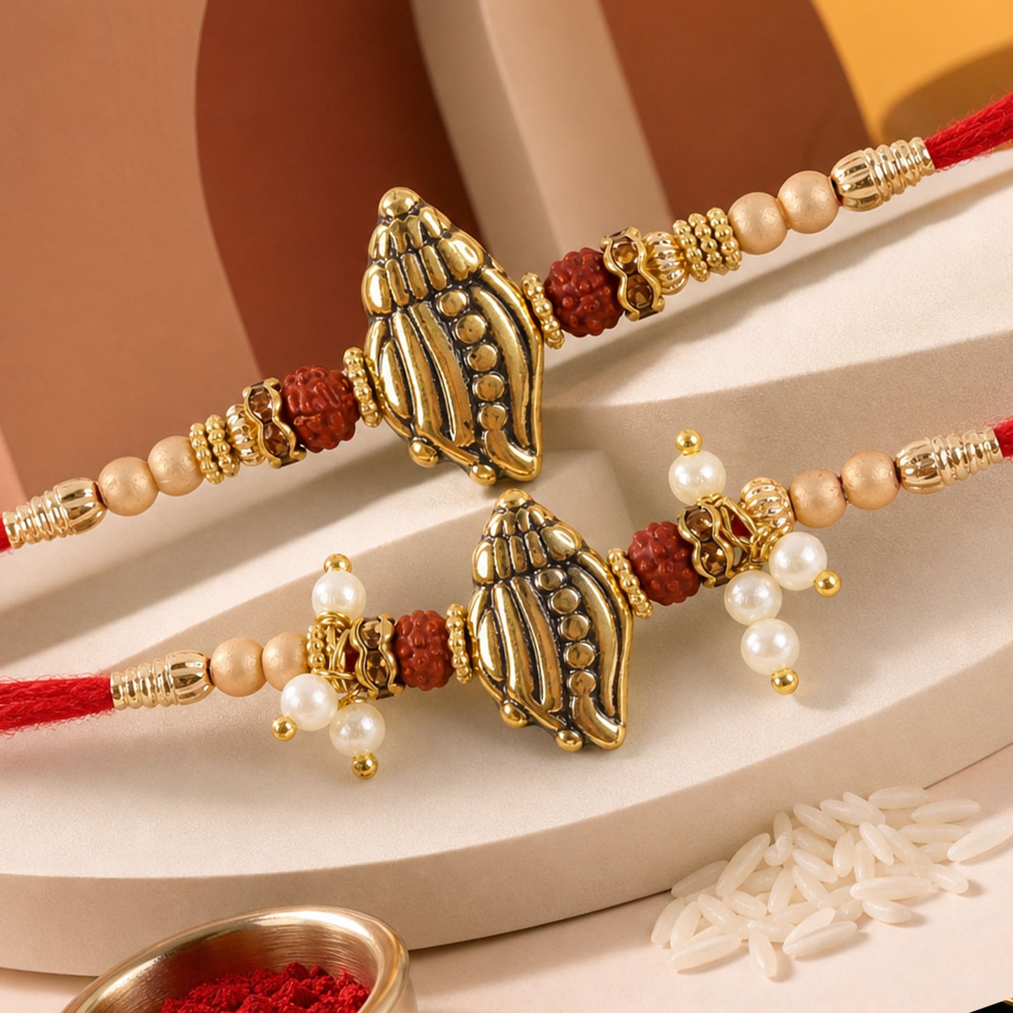 Antique Paisley Couple Rakhi Set with Rudraksha Beads and Pearl Lumba Charm Design